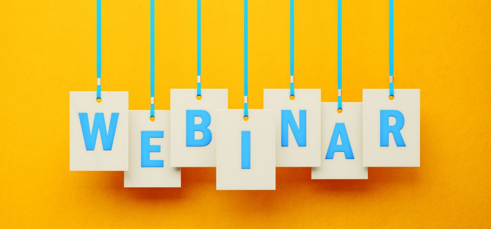 webinar-writes-on-white-price-tag-hanging-from-blue-ribbons-over-yellow-background
